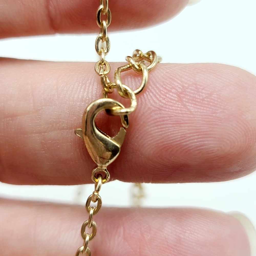 Gold tone religious charm necklace - Picture 3 of 5